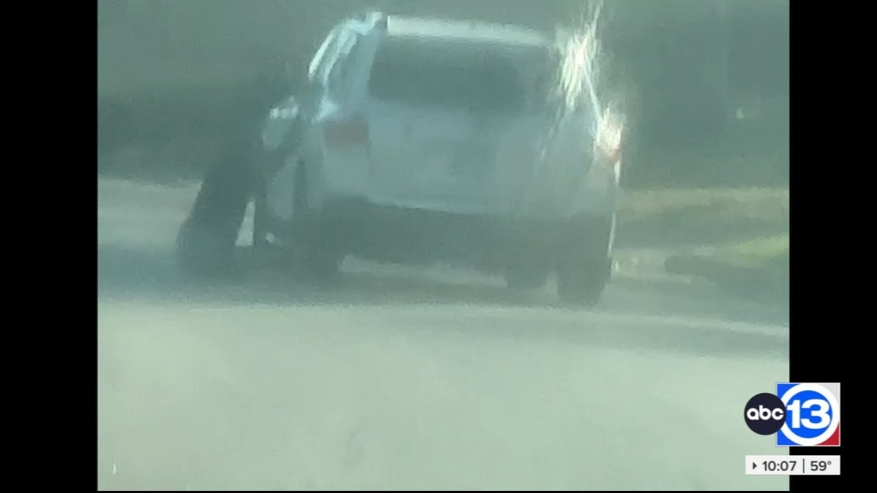 Caught on camera: Landscaper dragged down street by 3 robbery suspects