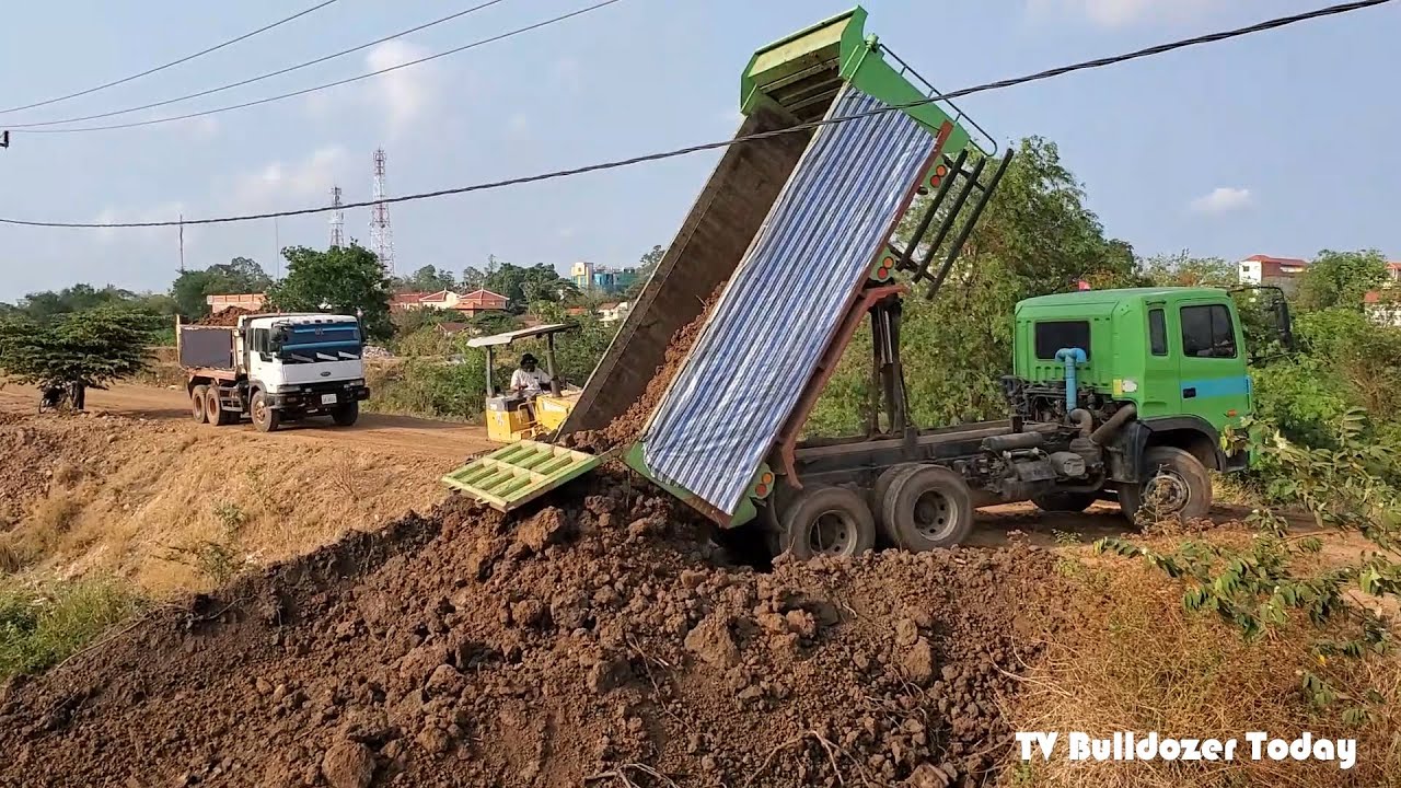 Step2- Good work activities​ KOMATSU D30P Pushes the Ground to Fill a Deep Pit​ & Dump Truck
