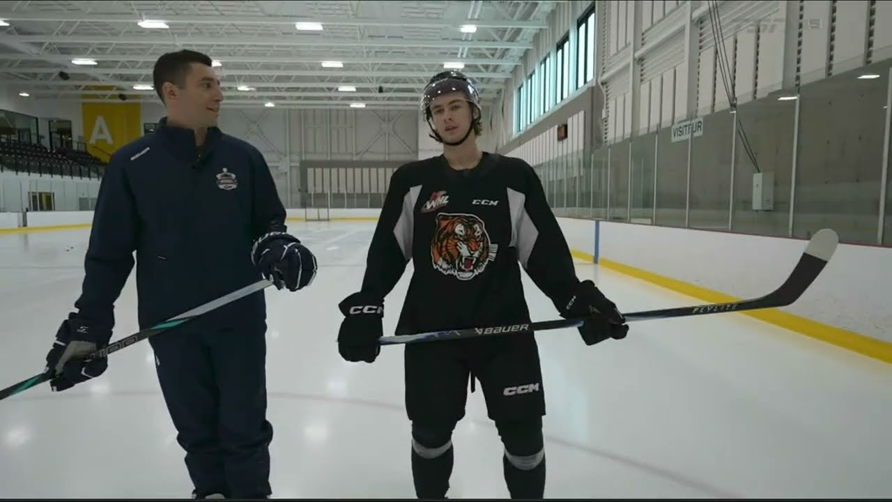 TSN in a players-only meeting:  Gavin McKenna of the Medicine Hat Tigers visits with Frank Corrado.