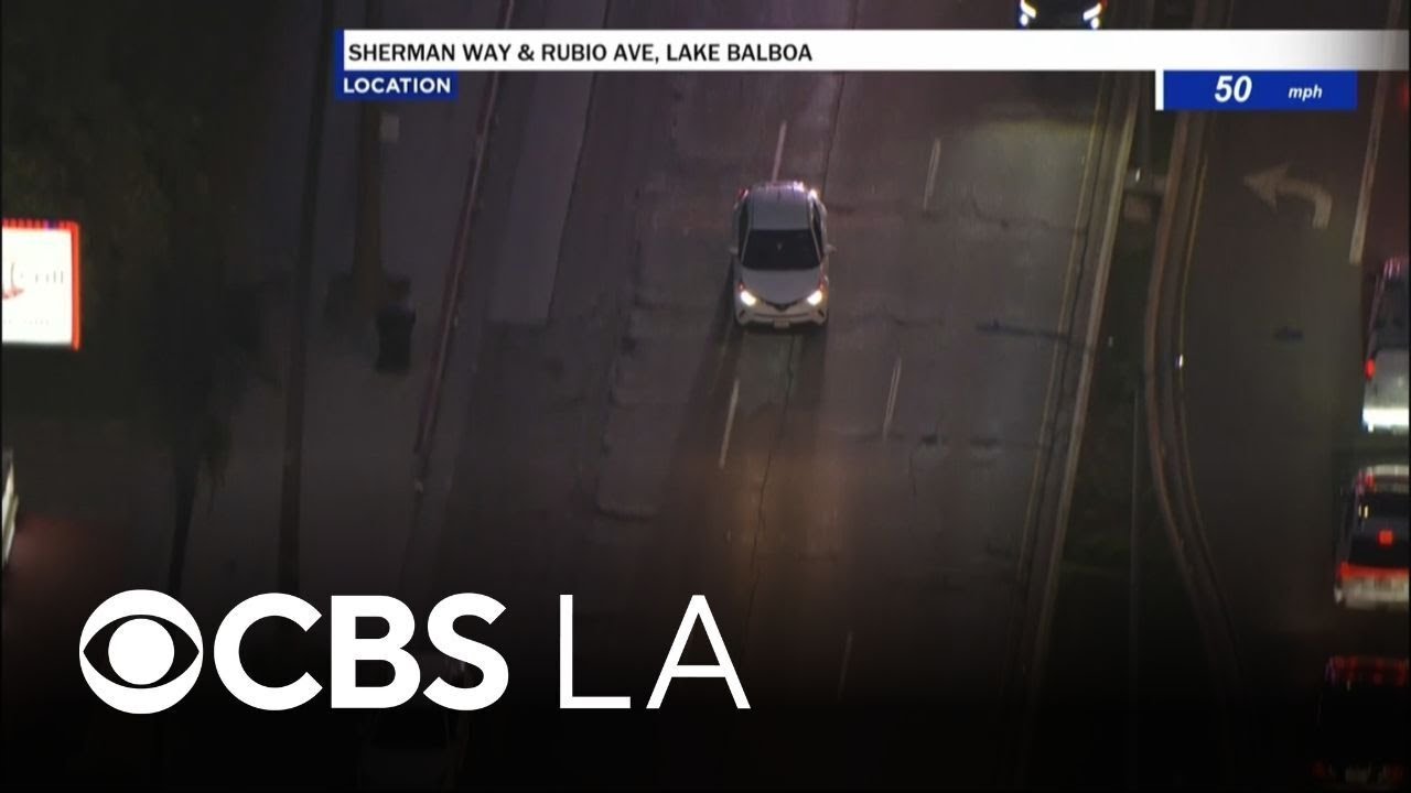 Los Angeles police pursue a stolen car in the San Fernando Valley