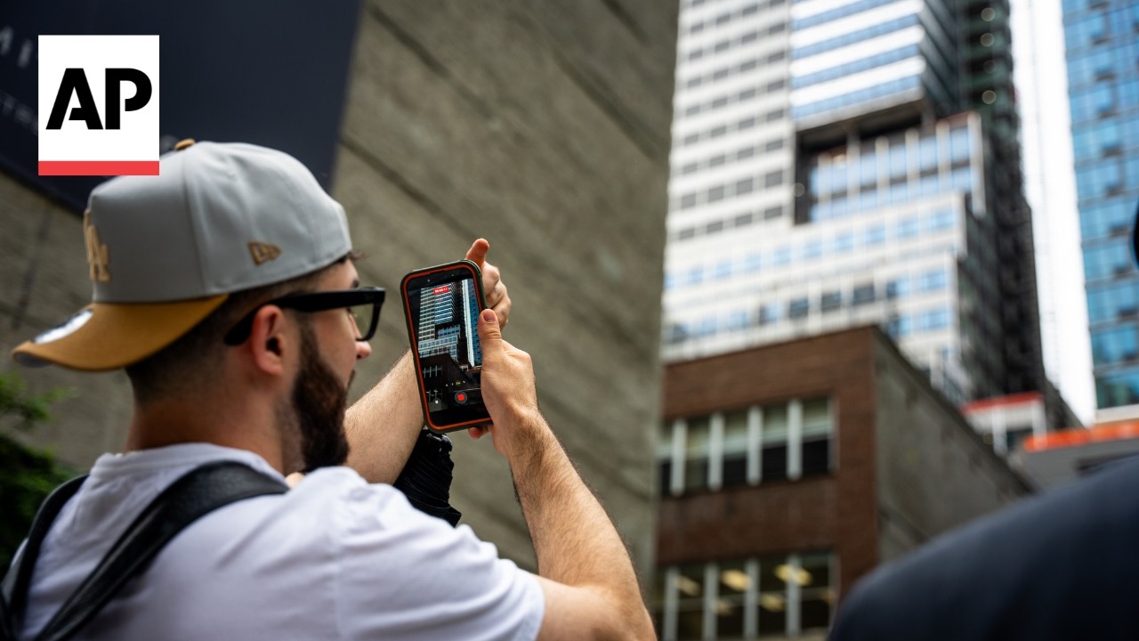 New York residents and tourists react to a high-rise building being unstable