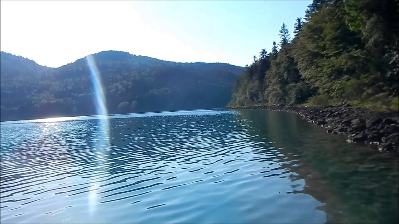 Bushcraft Girl paddles her beautiful wood SUP at dawn. (With Native American Flute)