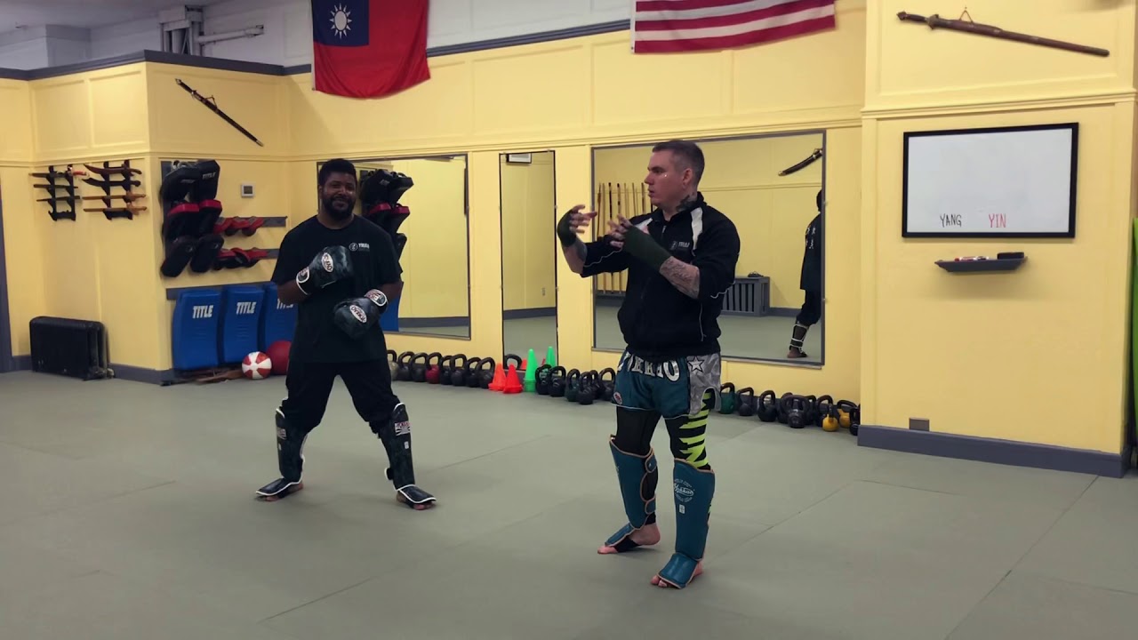 Sanda Kickboxing Techniques - Traditional concepts adapted to modern combat sport