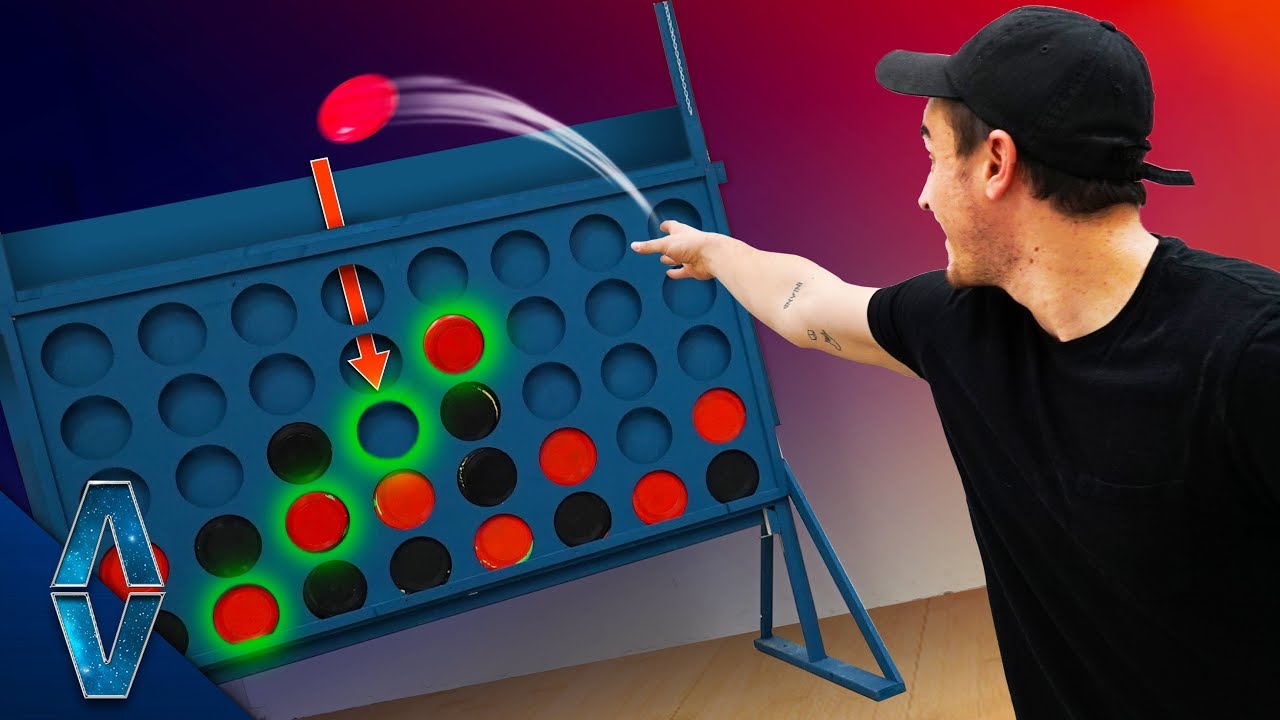 Playing GIANT Connect 4 With Frisbees!
