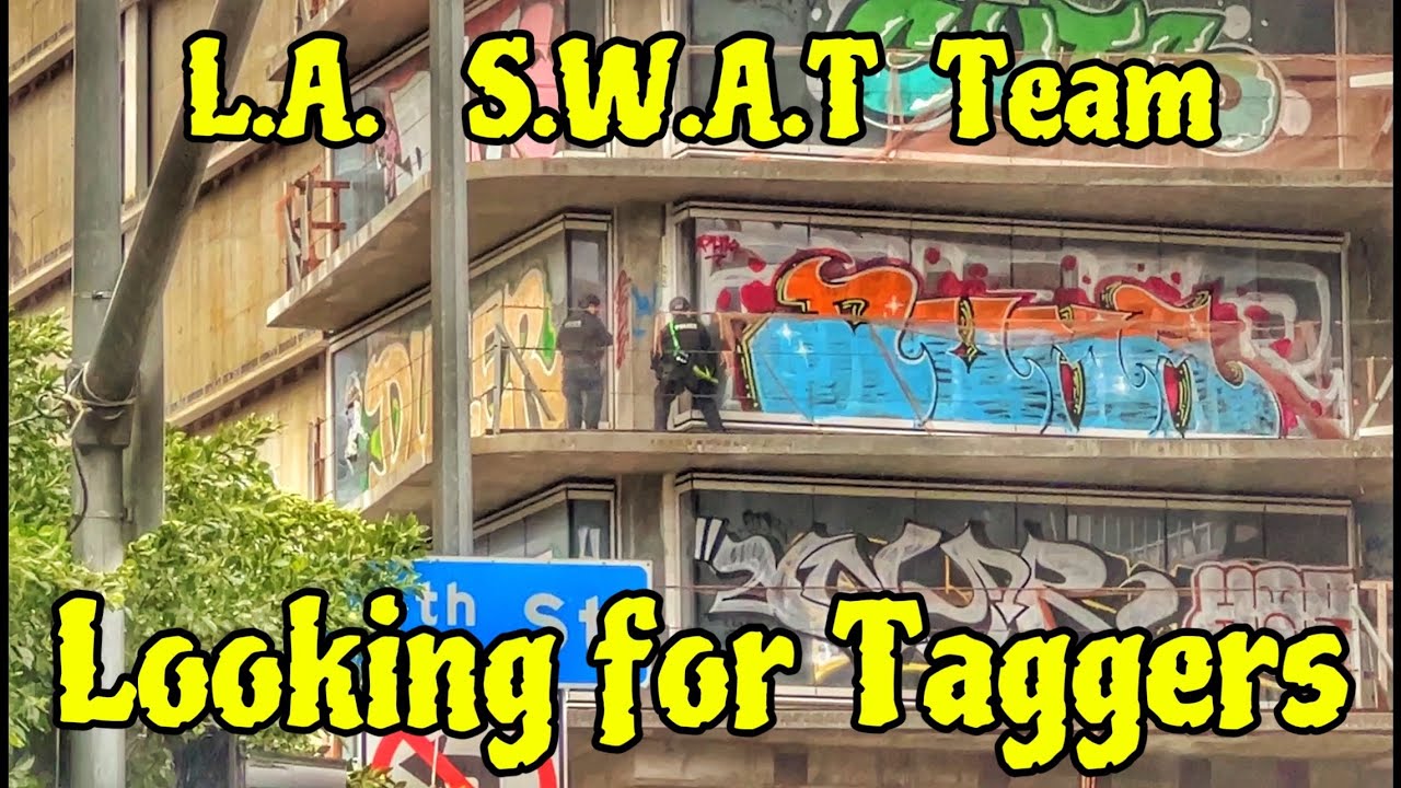 L.A.  S.W.A.T.  Team searching  abandoned high rise building for Graffiti Taggers