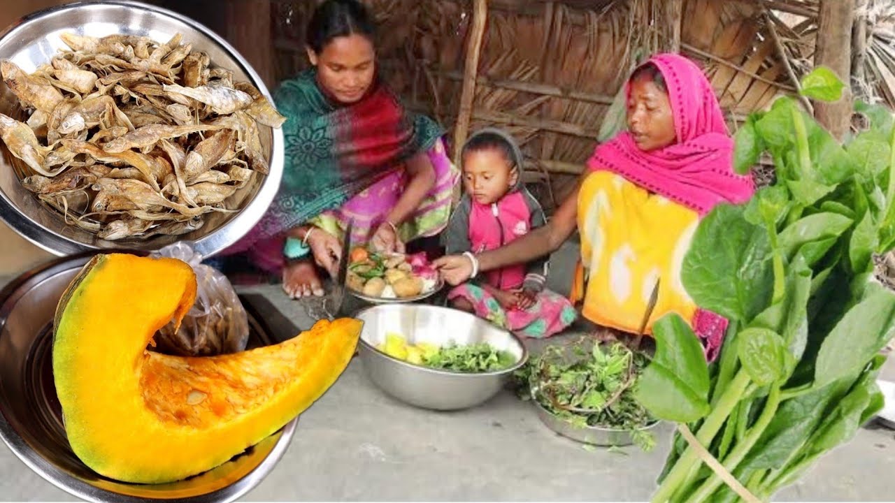 santali tribe traditional cooking DRY FISH curry with pumpkin prepared by santali family||rural life