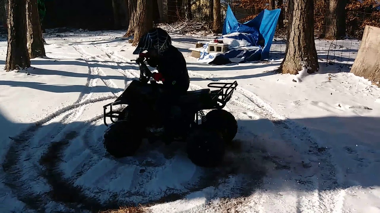 110cc chinese atv in the snow