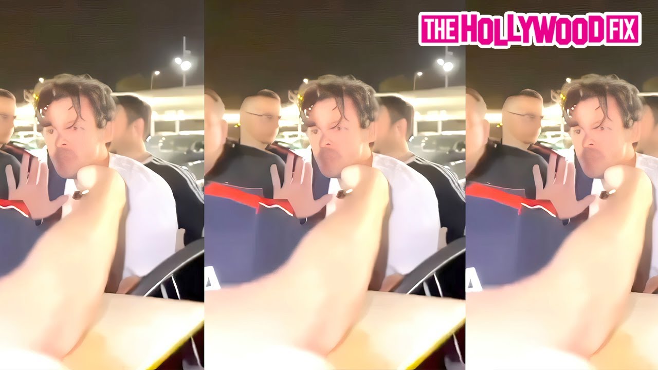 Harry Styles Is Mobbed By Overly Aggressive Fans While Arriving At The Airport In Barcelona, Spain