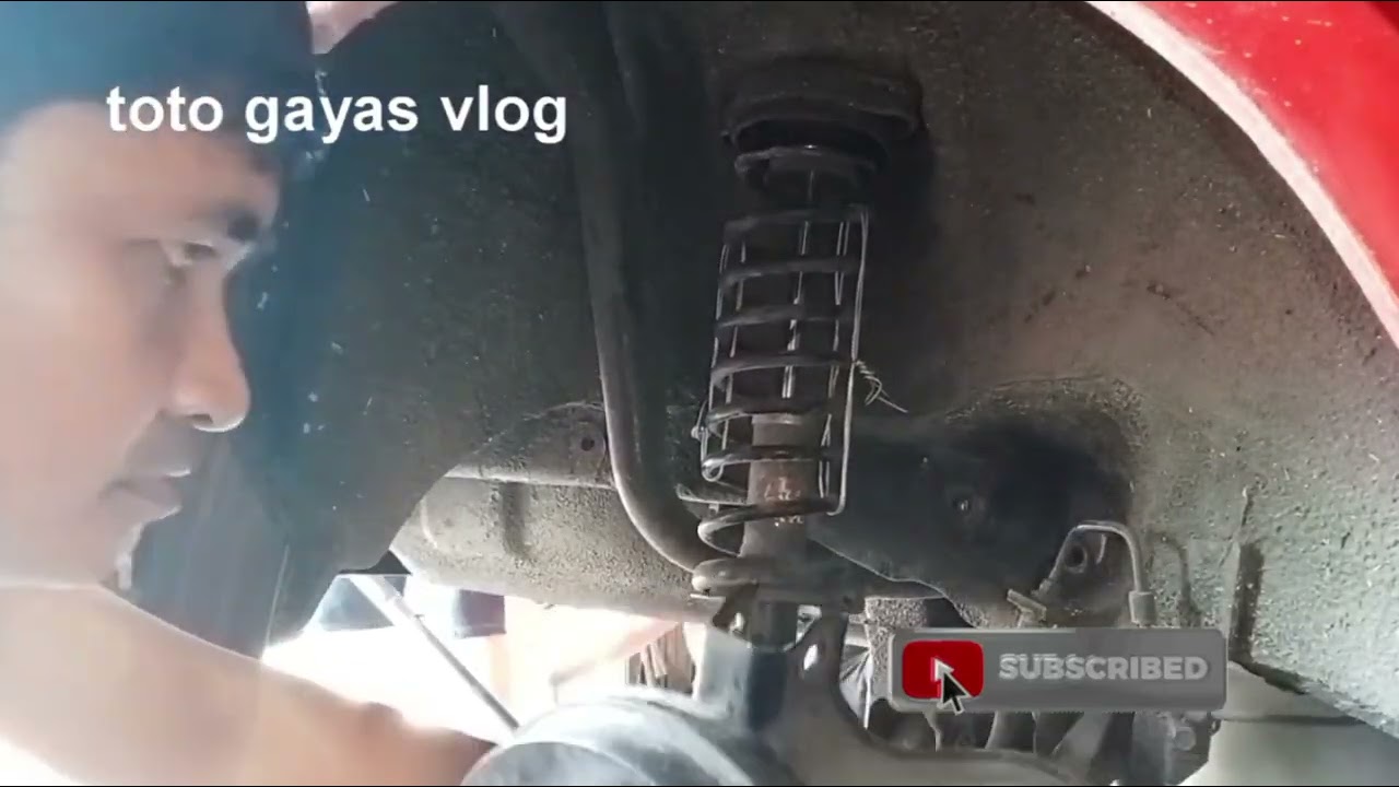 MITSUBISHI LANCER REPLACE LATERAL LINK AND BODY LEAF REAR.