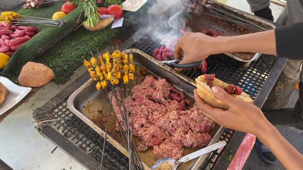 Taste of Marrakech: Street Food Bliss with Sausage, Chicken, Liver, & Broth at a Vibrant Taxi Stand