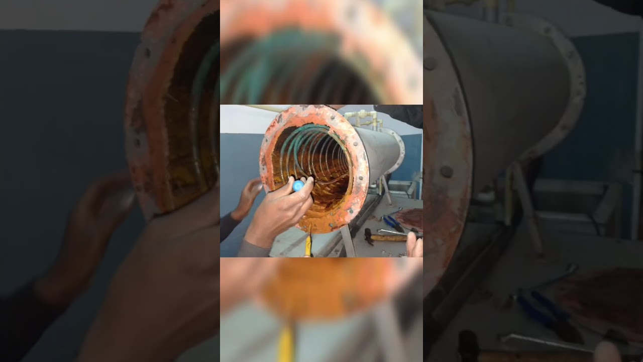 Shell and coil type condenser