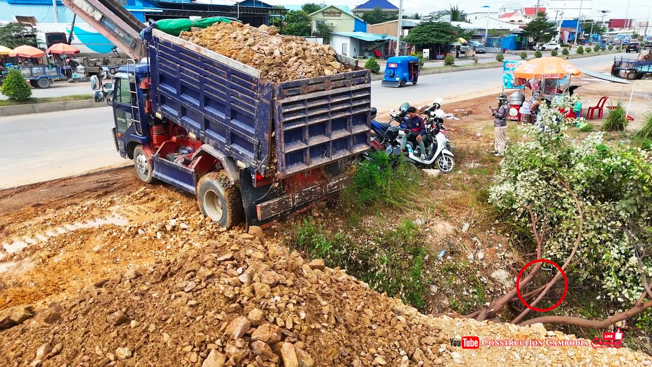 Nice job! filling corner complete by 5ton dump trucks dumping gravel soil and d31p bulldozer pushing