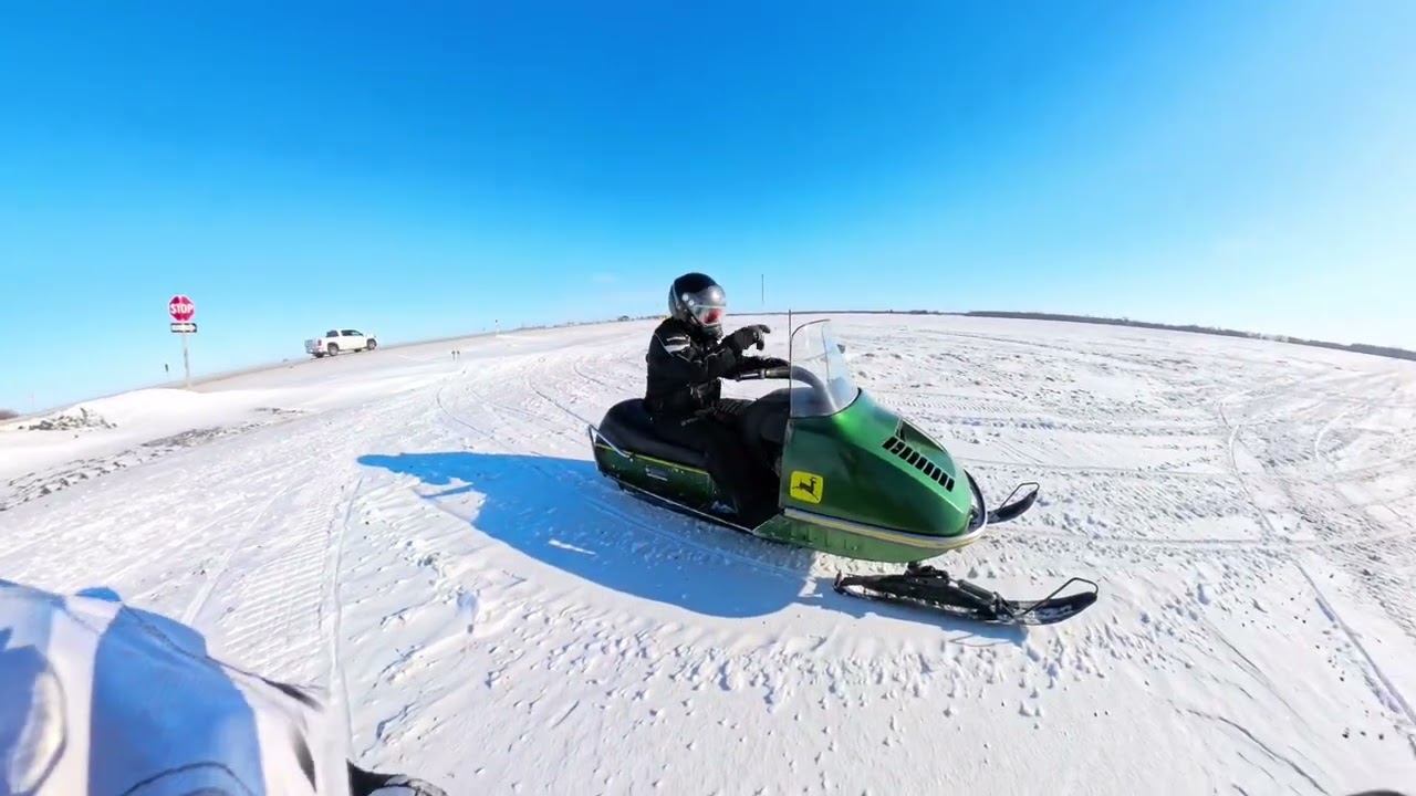 Riding our vintage snowmobiles in a new location