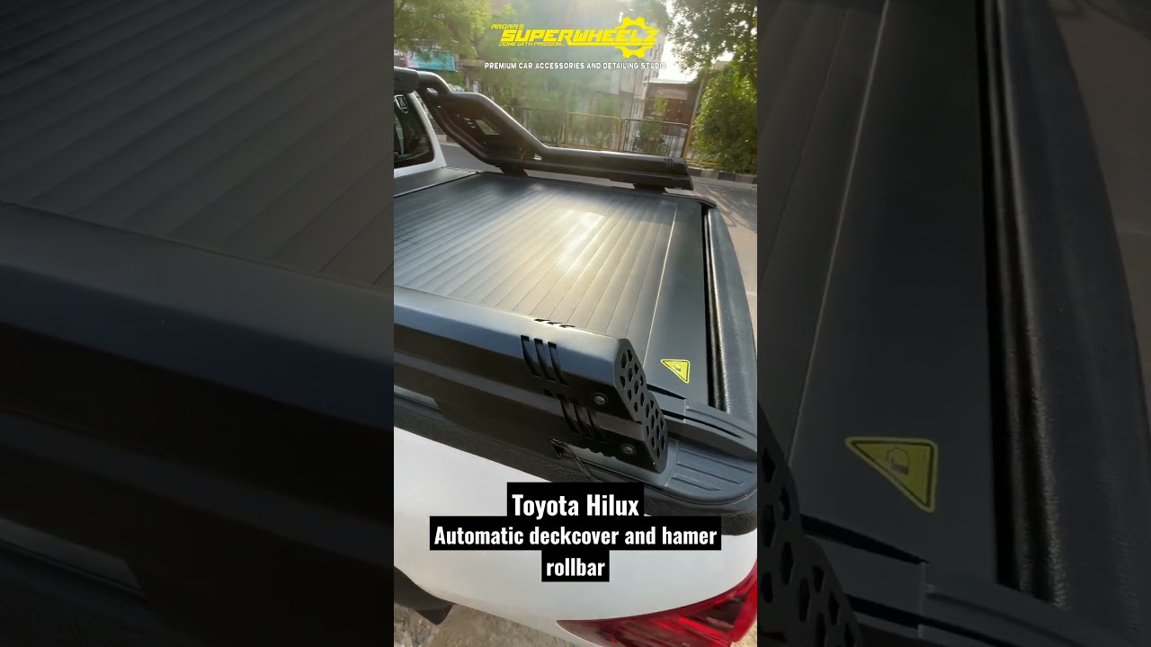 Toyota Hilux installed with automatic deckcover and hamer rollbar