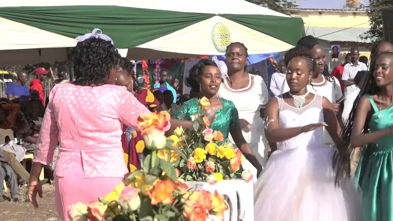 AIC KAPTEMBWA CHOIR PEARFOMING AT FAITHS WEEDING
