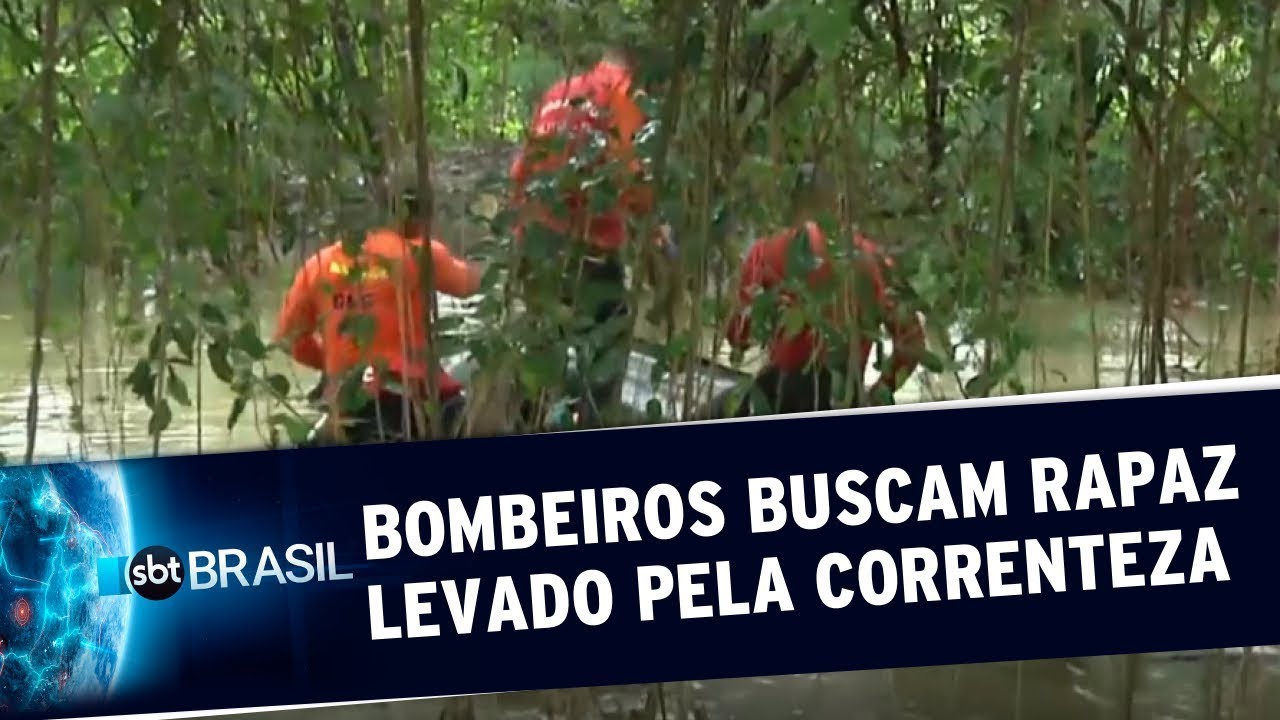 Bombeiros buscam rapaz levado pela correnteza durante temporal no Rio | SBT Brasil (02/03/20)