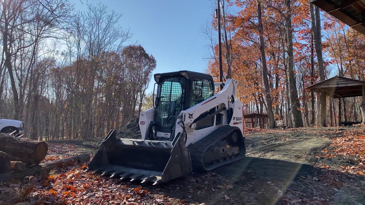 1) Bobcat T590 fixing driveway