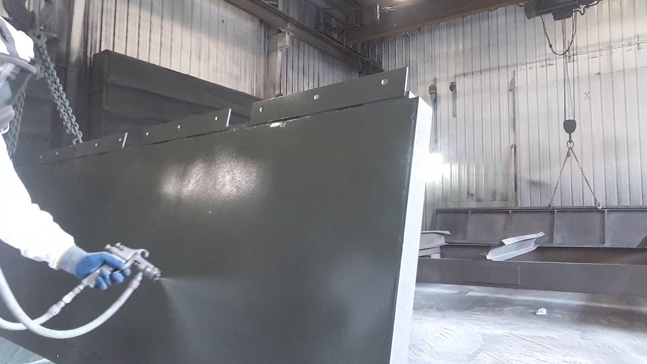pintando con zinc/ this is how we spray zinc.