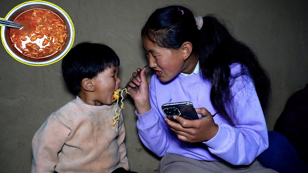 Sister feeding Jonson after school II Jonson having snacks with sister@Pastoral  Life of Nepal