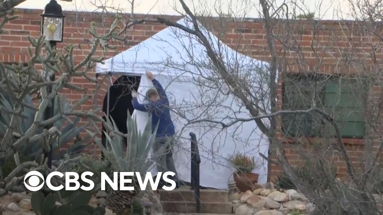 White tent set up on Nancy Guthrie's front porch