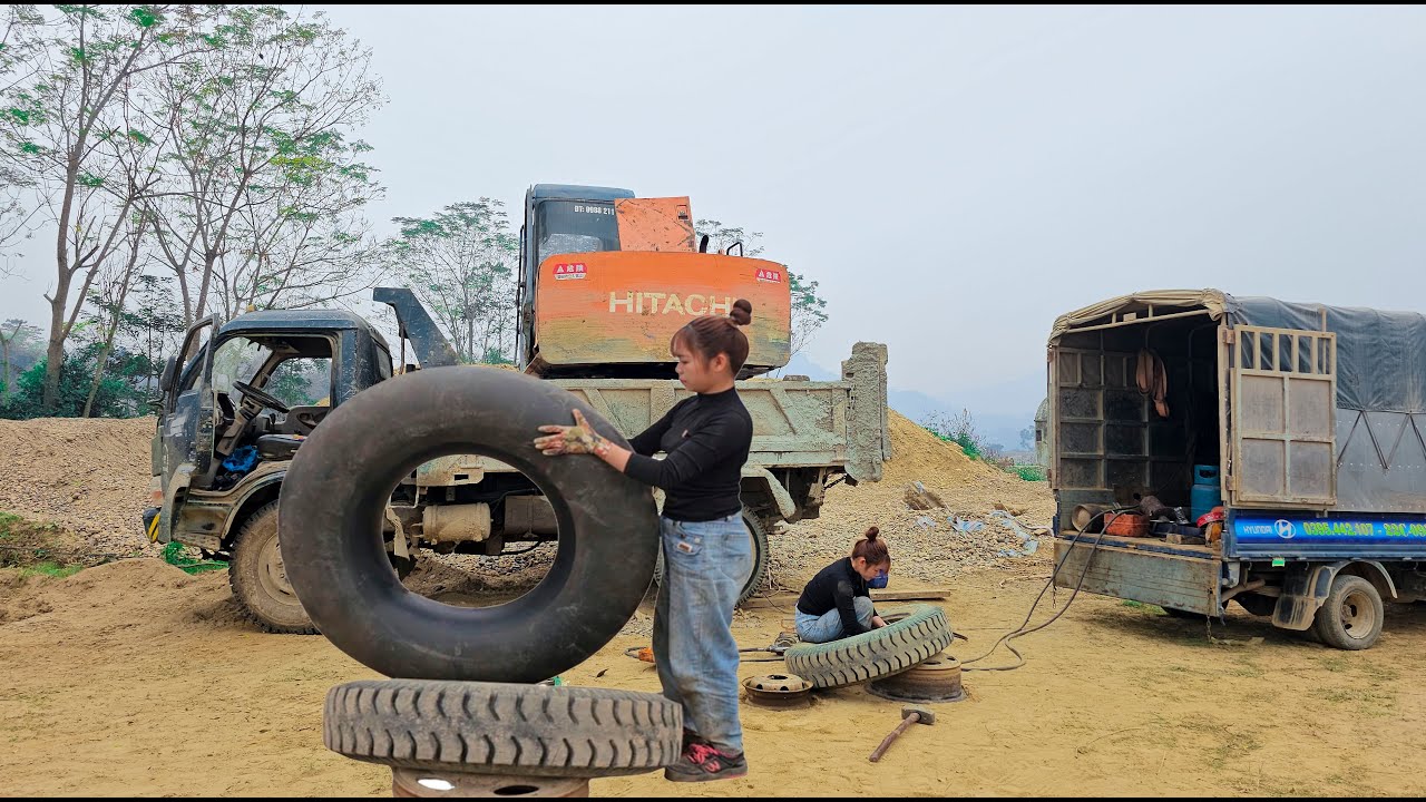Mechanic girl rescues truck with broken tire
