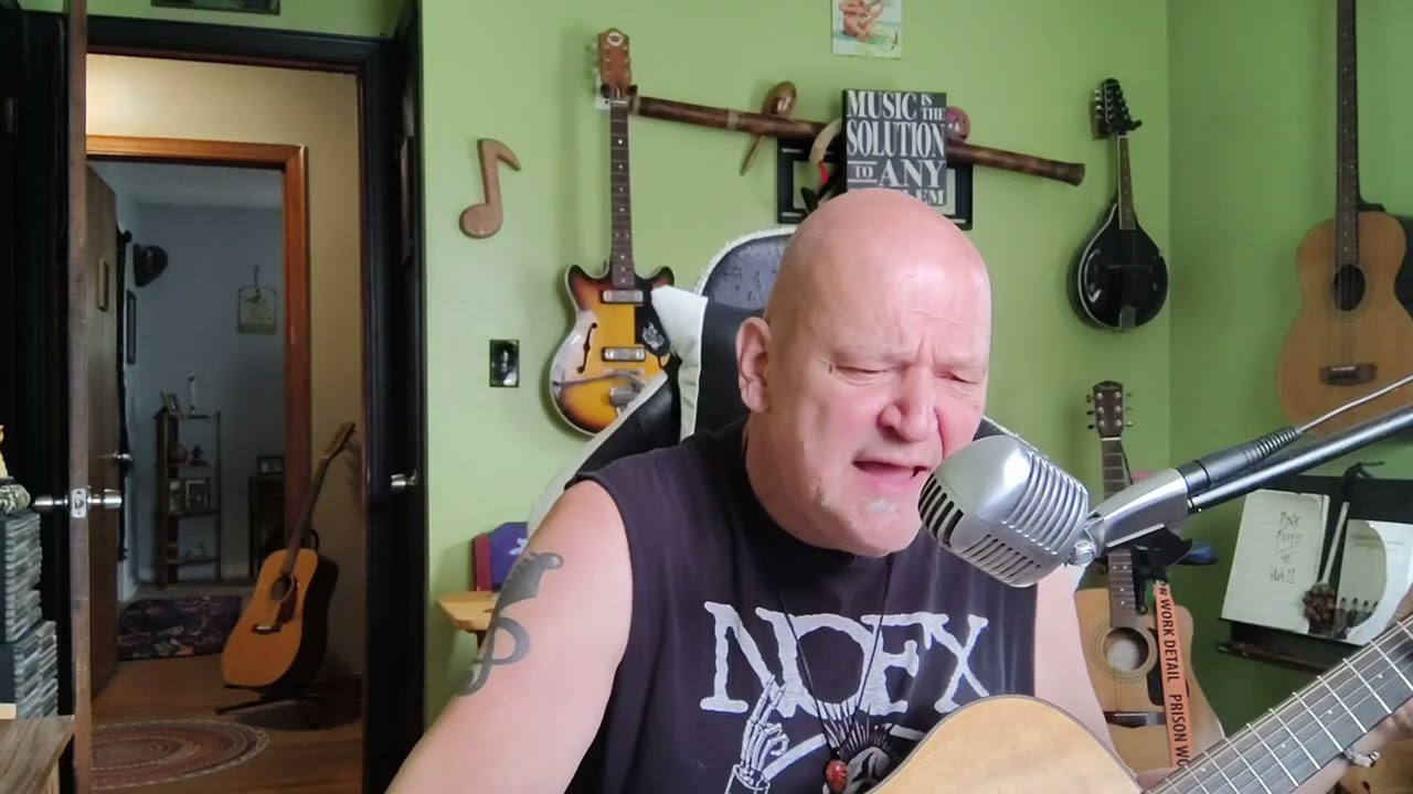 Broken Strings On An Old Guitar  ( Lyrics by Sandee )