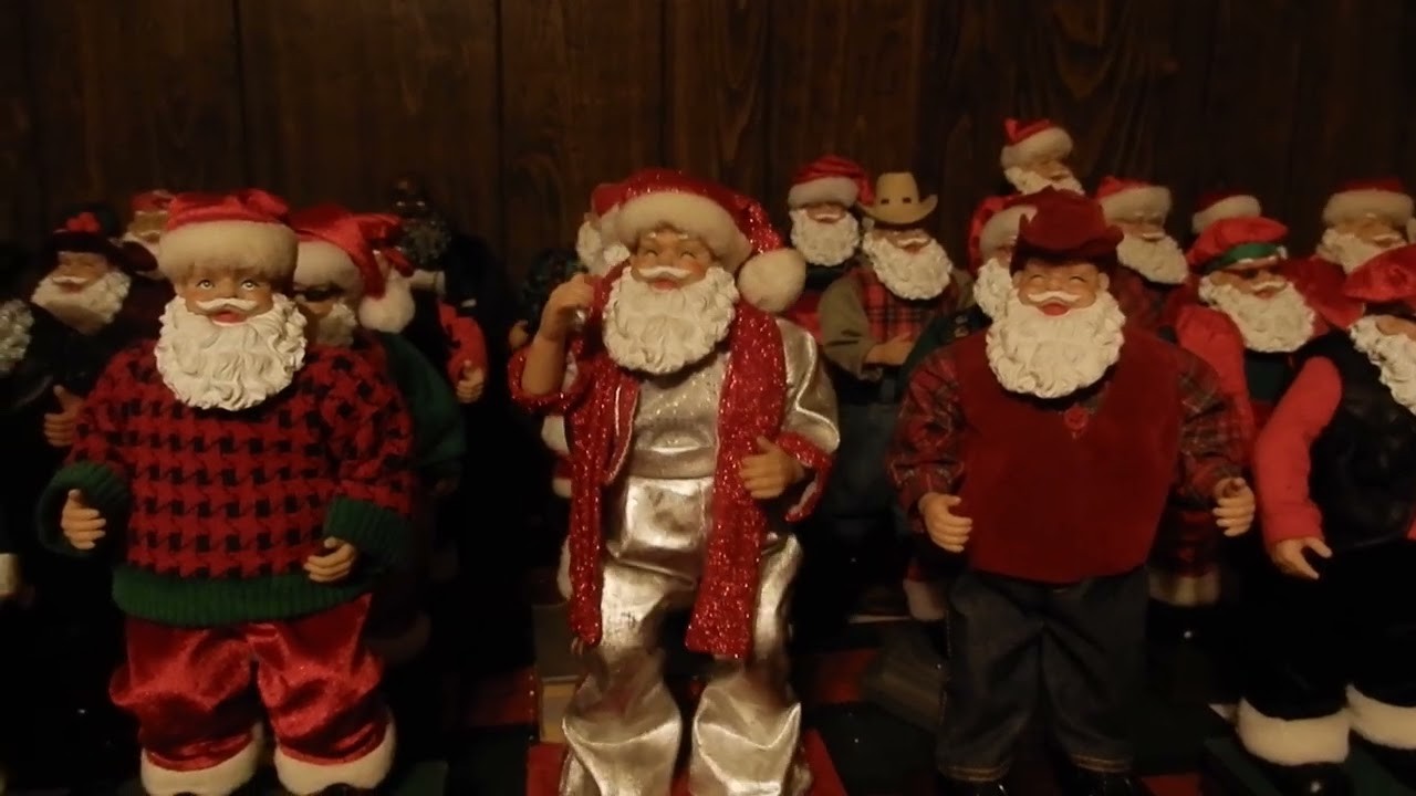 TL Toys Sing & Swing Rock N Roll Santa (German exclusive jingle bell rock version)