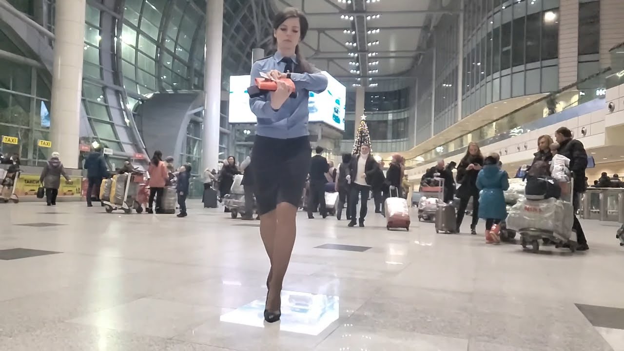 People's walking in slow motion in airport