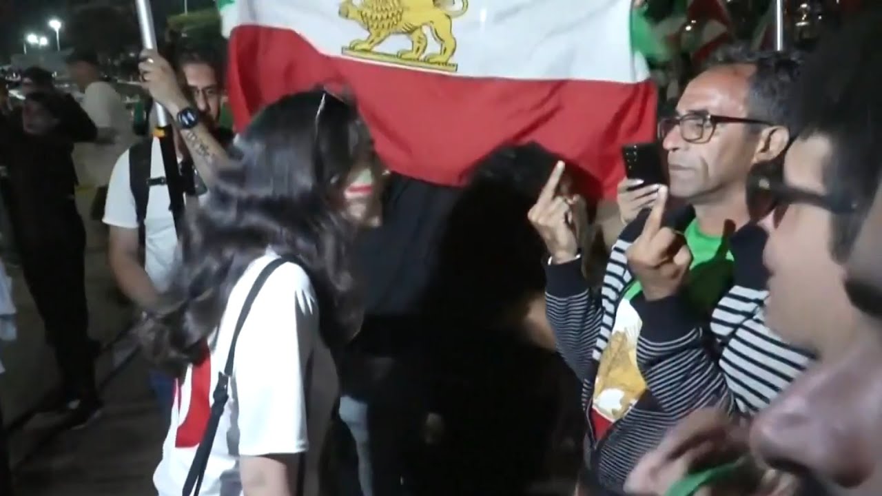 Anti-regime and pro-Iran protesters clash outside FIFA World Cup game