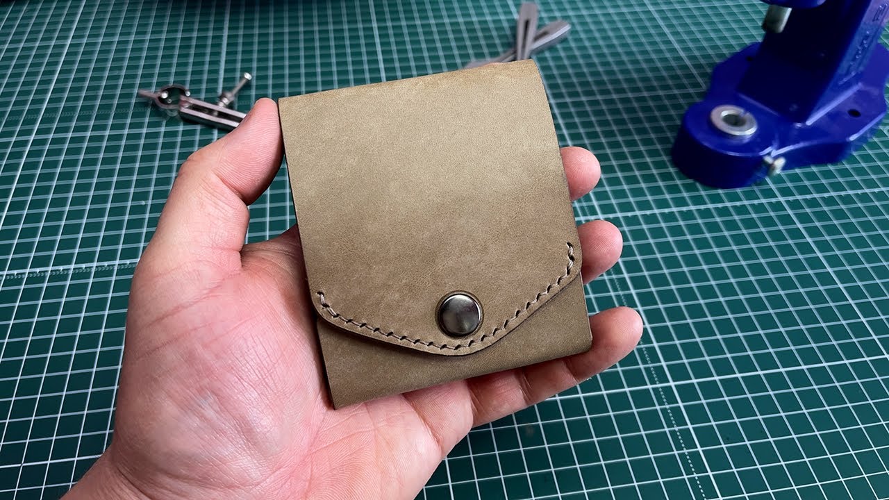 Making an unusual mini wallet made of leather.  PDF pattern in the description under the video