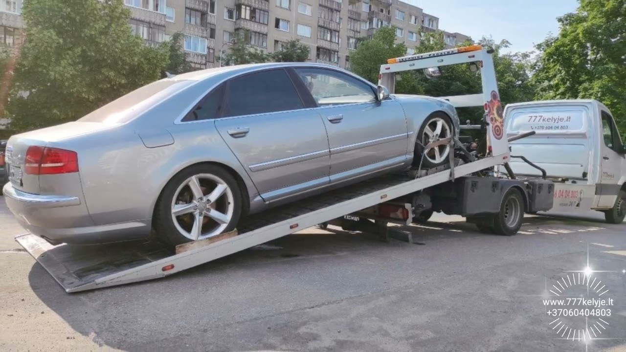 Tralas Vilniuje - Audi A8 neisimeta i N - Pervežimas su spec priemonėm @