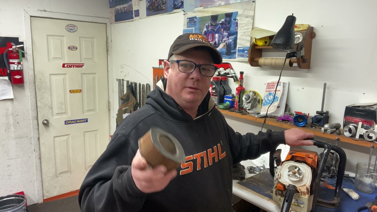 Donny walkers chainsaws checking out a Stihl 500i