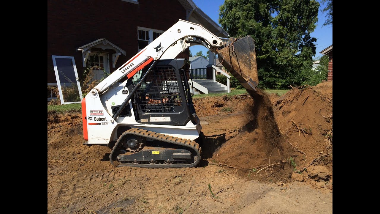 Moving the earth with a bobcat t450 and ford f450+ 3500hd