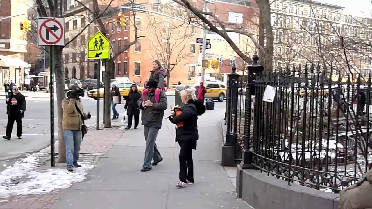 hugh jackmans family  surrounded by paparazzi in newyork