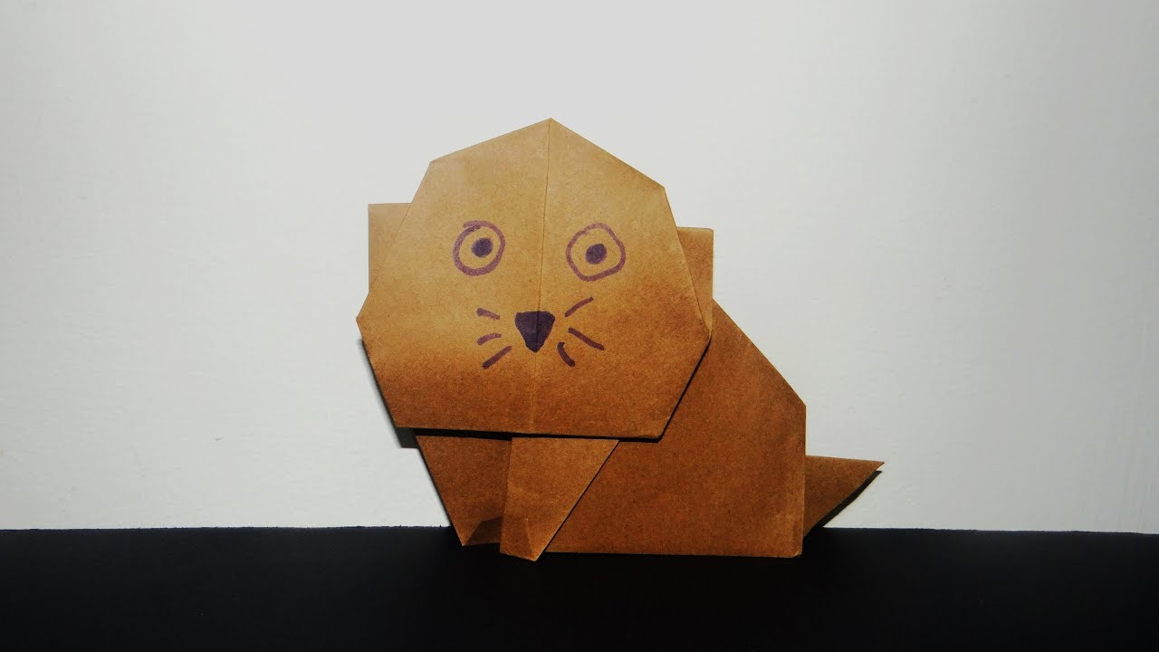 Como hacer un gato de papel paso a paso con la técnica de origami.