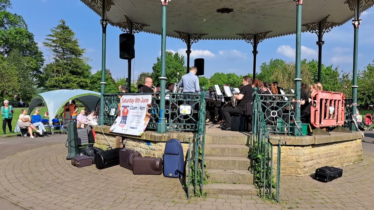 Littleborough Band performing an ABBA medley in Hare Hill Park, Littleborough.