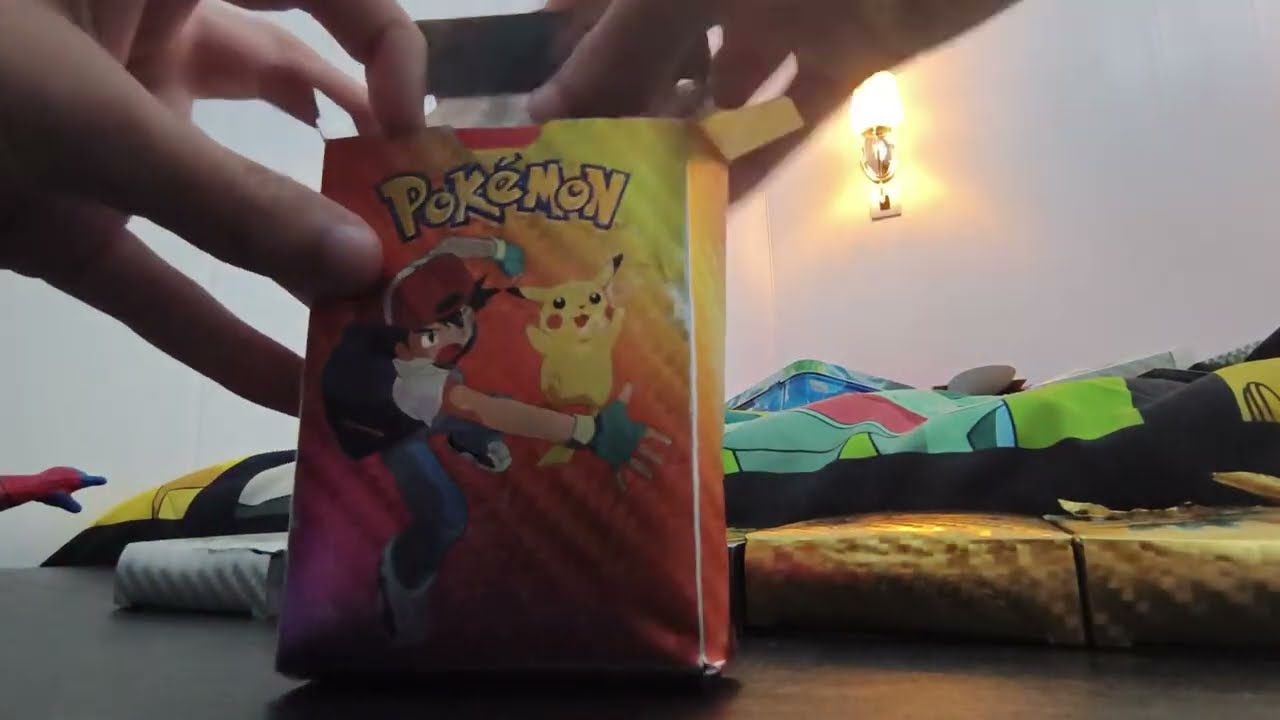 Cartas de Pokémon 5 masos tres masos negros y dos masos dorados