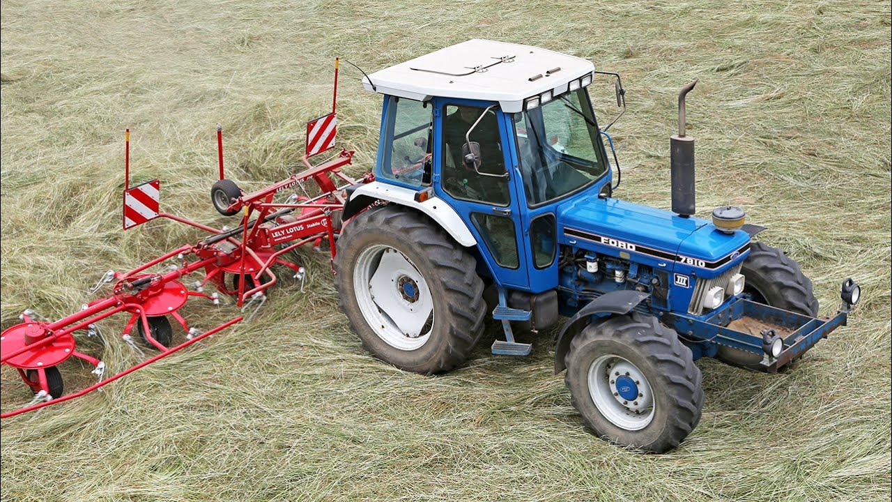 Classic 1990 Ford 7810 Gen III turning grass with a Lely Lotus 770 tedder | Farming with Ford