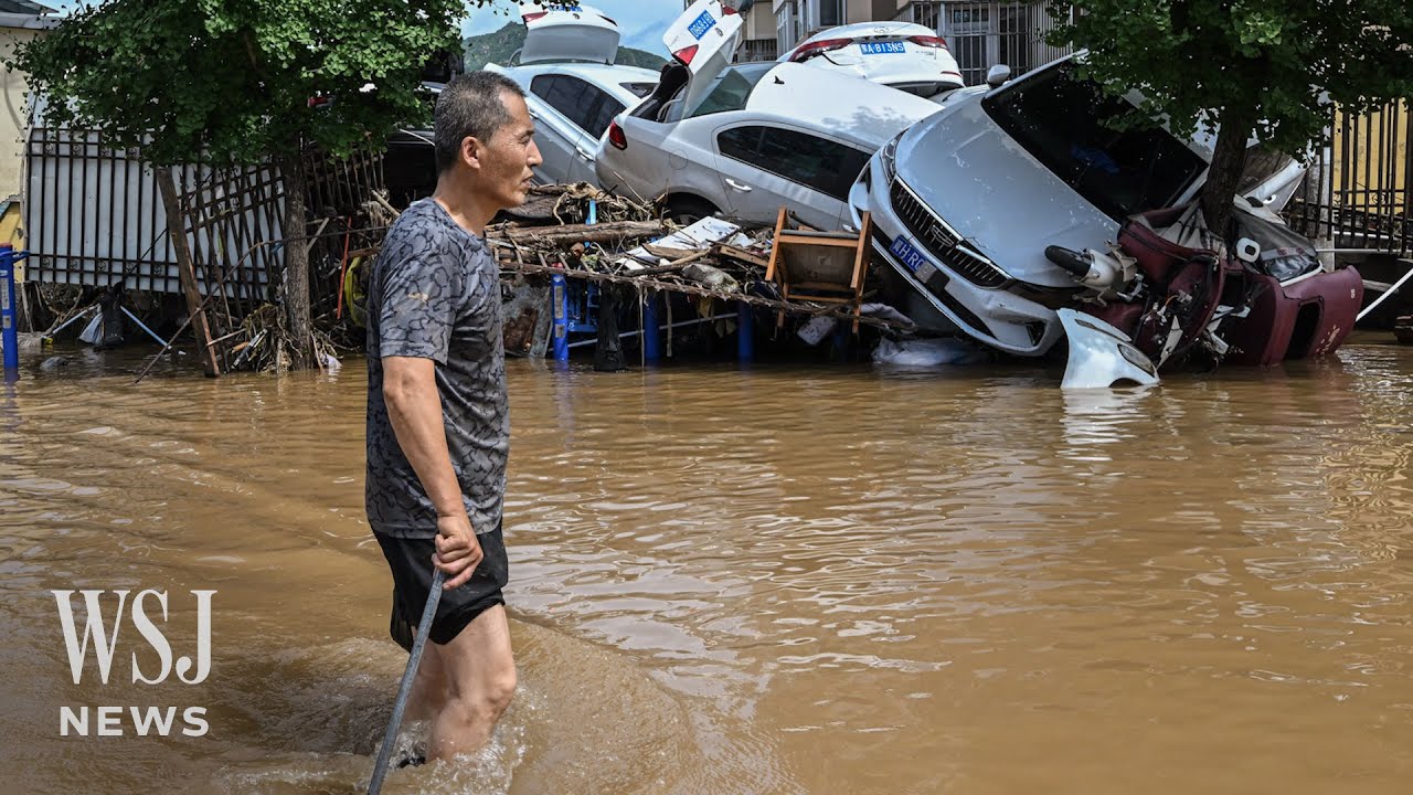 30 Dead, Thousands Evacuated Amid Beijing Floods | WSJ News