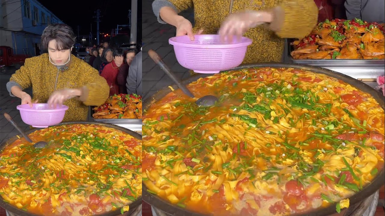 A Chinese Guy Cooks Duck Leg Noodles Food with Tomato Eggs on the Street in the Downtown 鸭腿番茄鸡蛋面