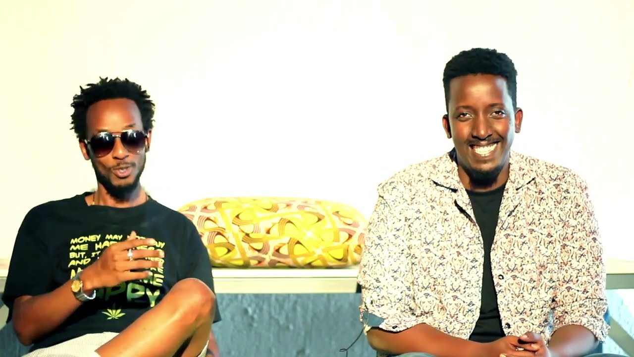 Michael Sengazi (comedian, actor, author) na Davy Carmel bishuye 7 Questions