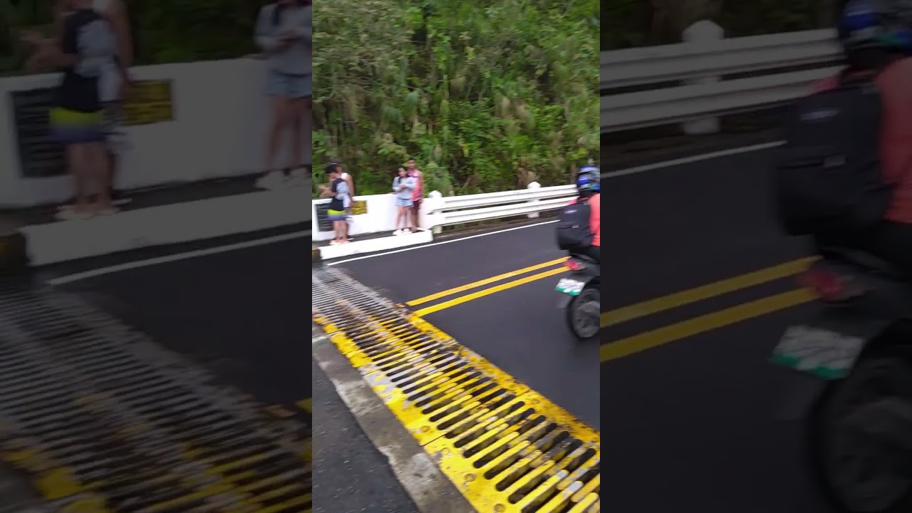Walking across the Agas Agas bridge in Southern Leyte