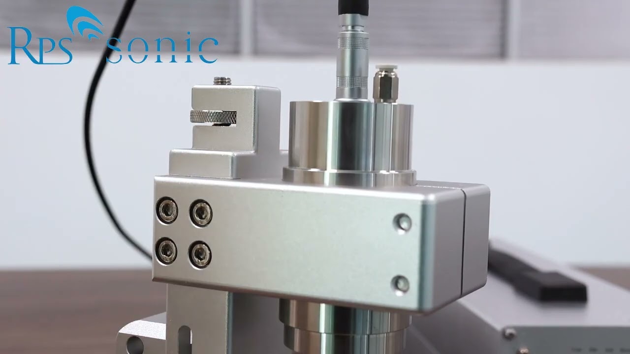 Ultrasonic fabric cutting and sealing machine