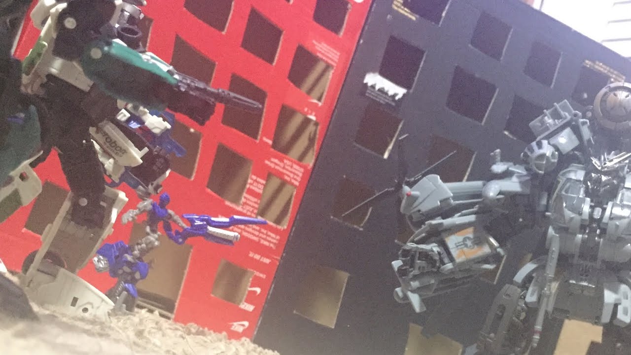 Wheeljack roadbuster and chromia vs blackout (transformers stop motion)
