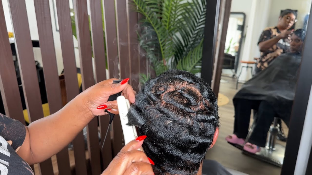Short cut with finger waves on medium density hair