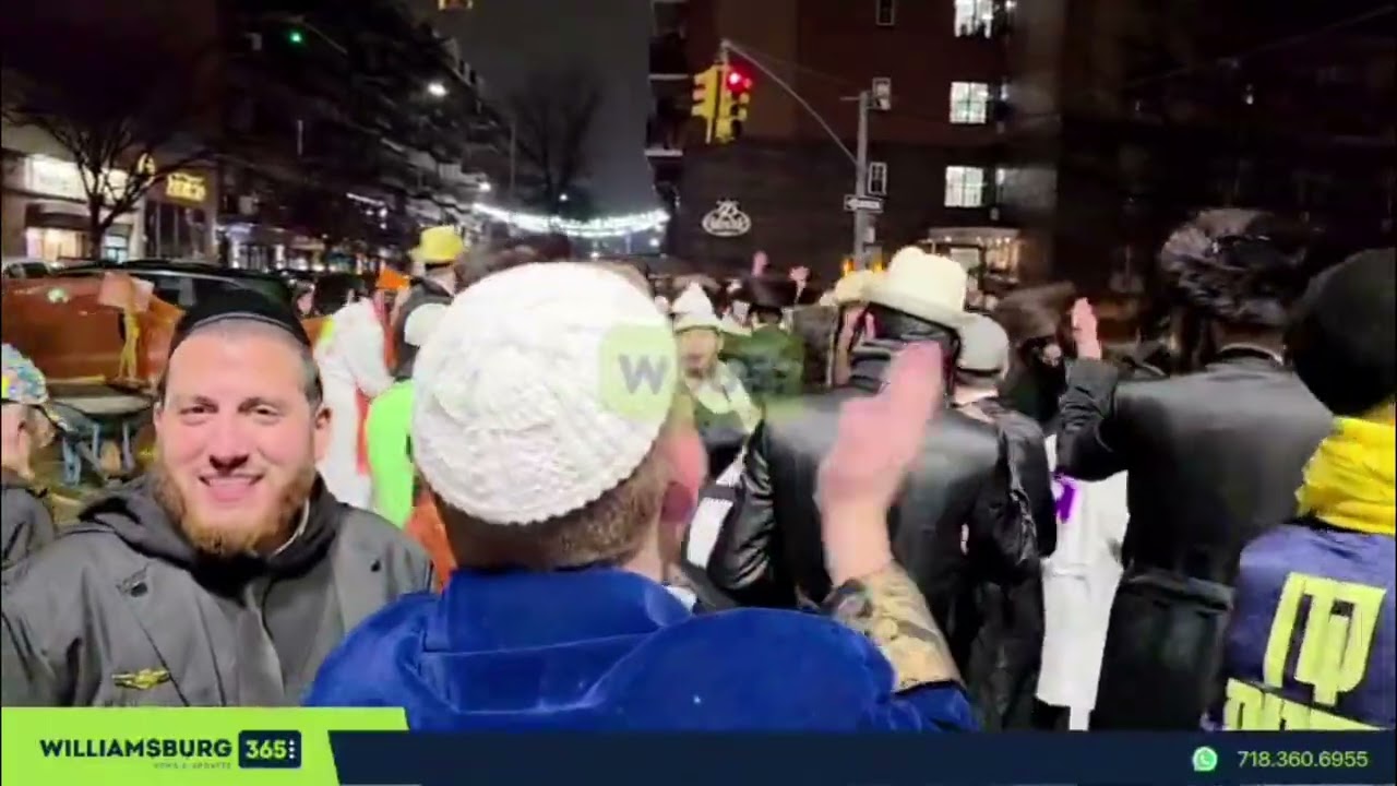 Dancing in the streets at Lee Ave & Wallabout St on Purim