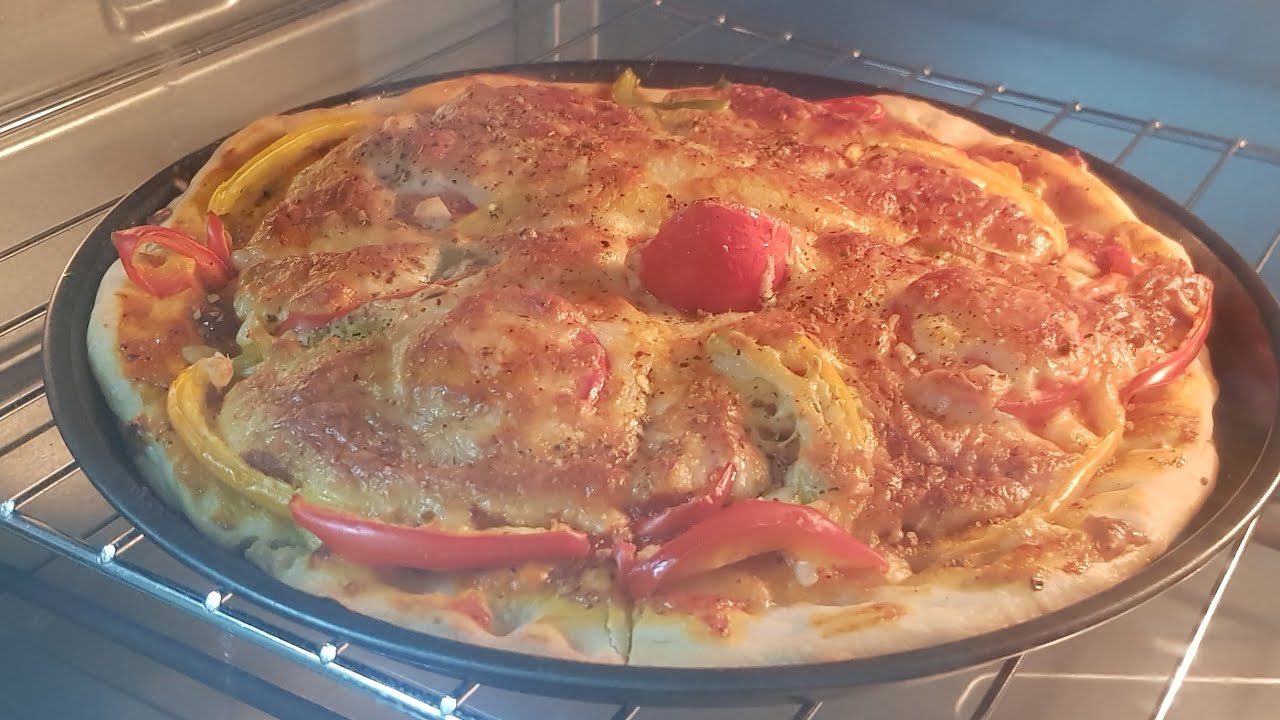 PAN PIZZA RECIPE in tamil/in OTG Oven /how to make pan pizza in otg oven