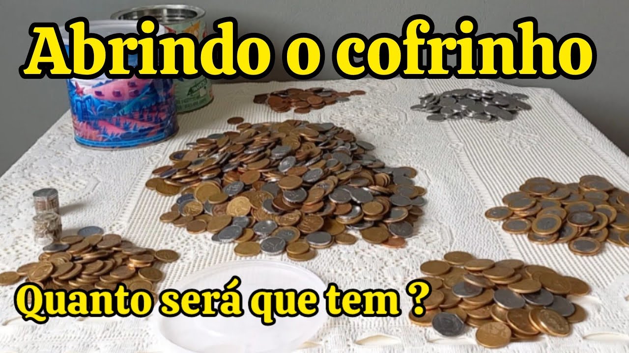 abrindo o cofrinho só com moedas/ vamos ver quanto tem?