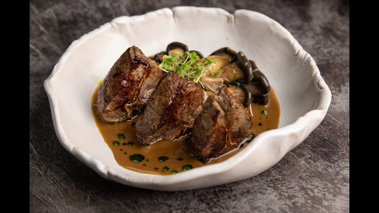 TERRA RICH: T-bone lamb with demi-glace sauce, coconut milk, shiracha, and smoked shiitake mushrooms