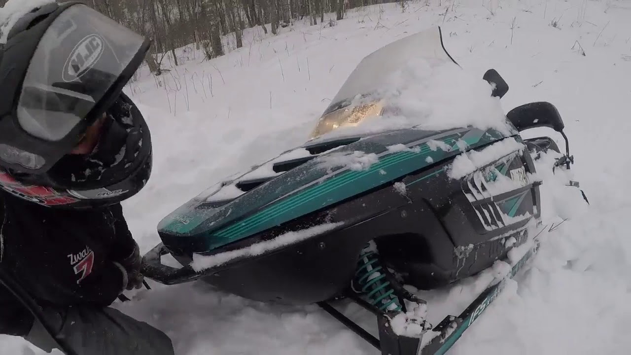 Munger Trail snowmobile ride - stuck kid, state trail, flat tire